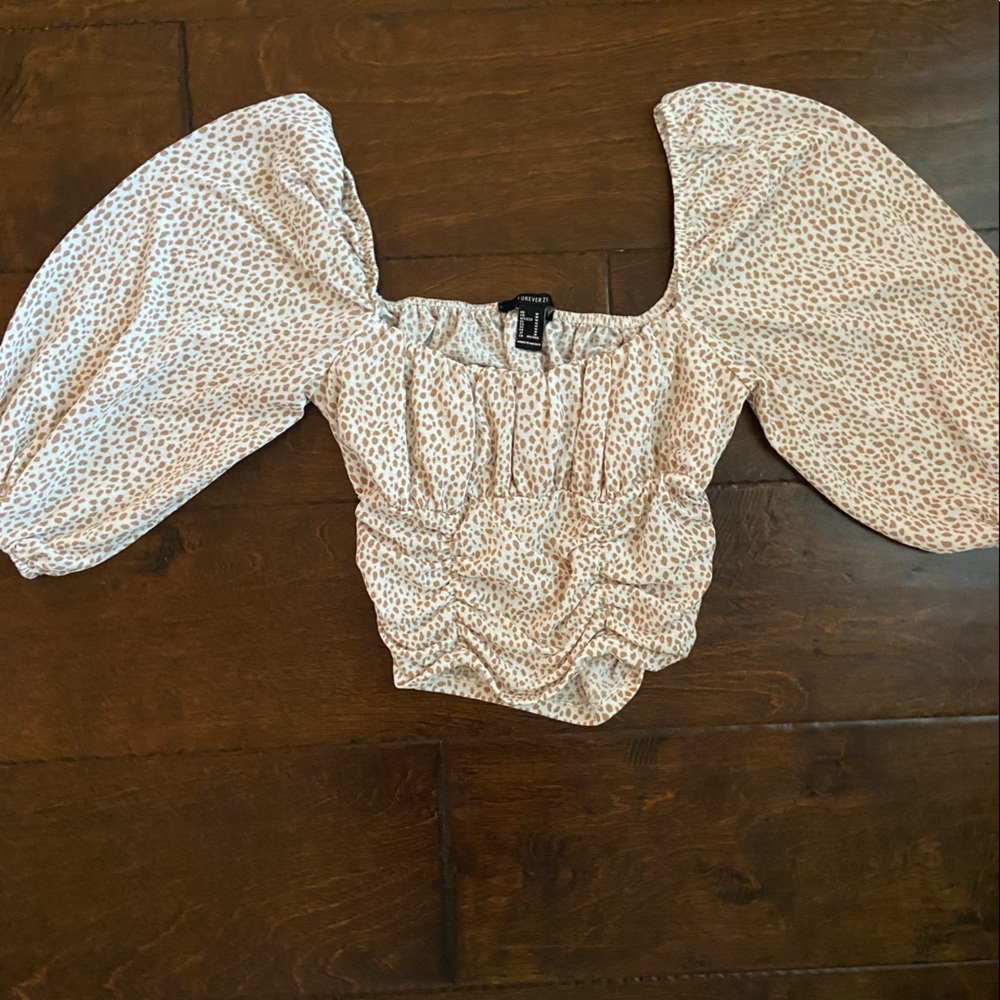 Cheetah print top. Size medium.
